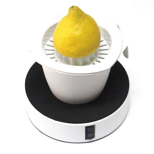 Easy-Up used to hold a lemon squeezer in place